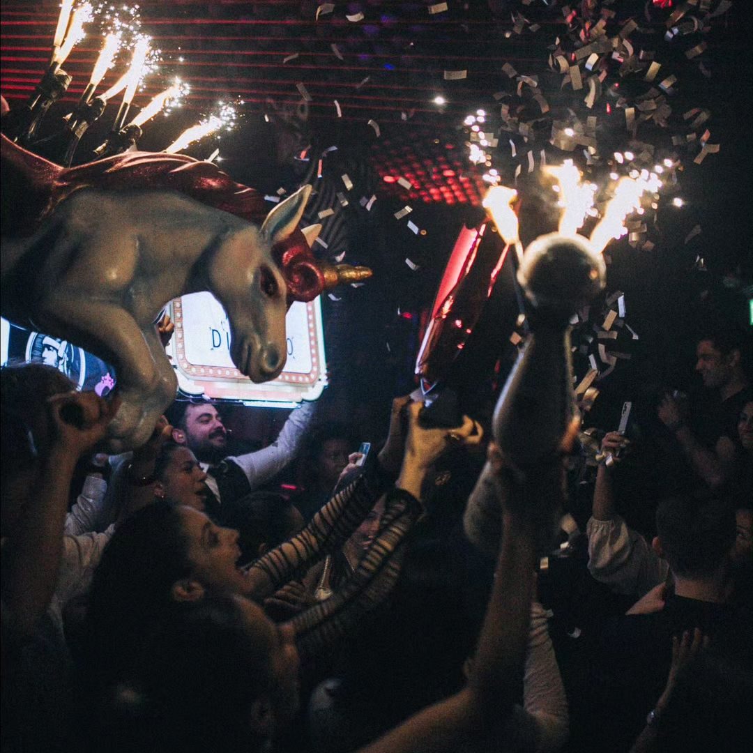 Cuckoo Club champagne show on a Cuckoo Club table.