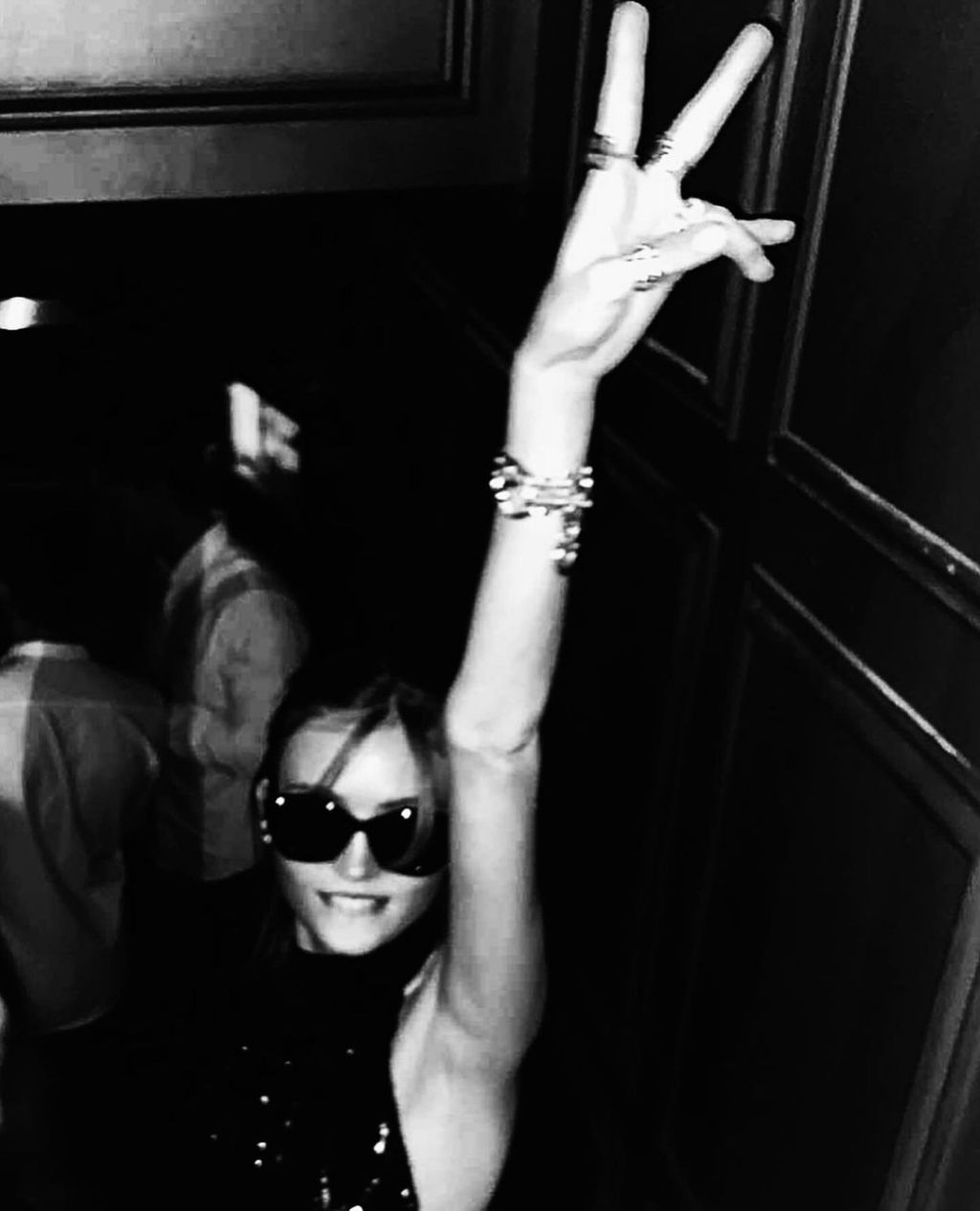 A girl dress according to the Scotch of St James dress code in an elegant black dress.