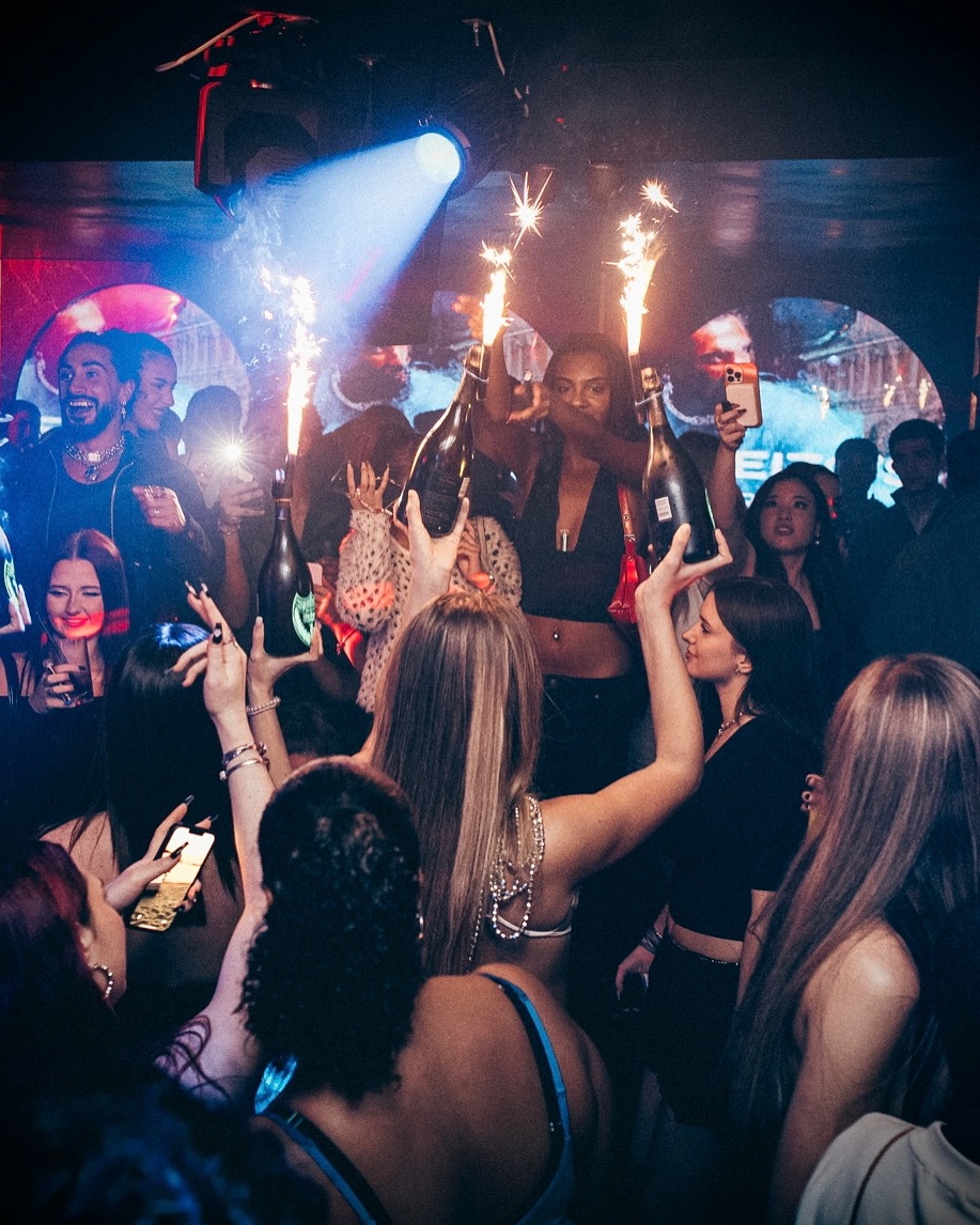 Selene London guestlist clients enjoying a champagne show with bottle sand sparklers.