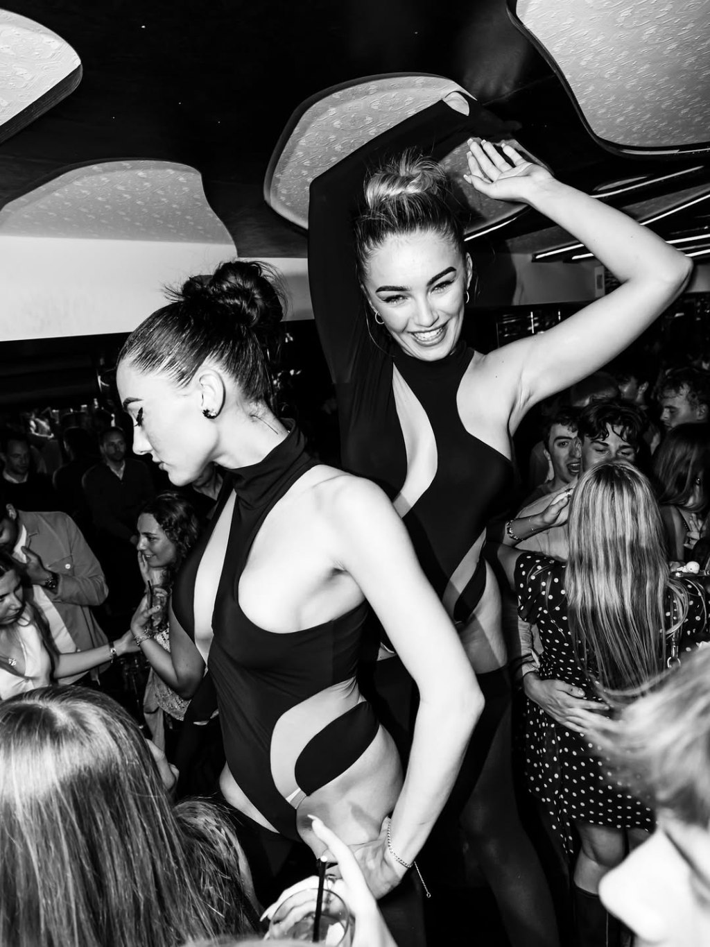 Rex Rooms London table clients dancing.