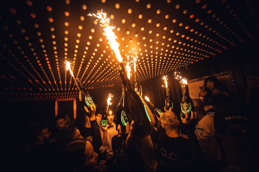 A champagne show for a VIP table inside a Mayfair club in London.